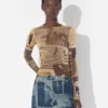 Das „Journal Double“ Baby-Tee Das „Journal Double“ Baby-Tee