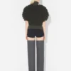 Der ärmellose Pullover mit Schlingenmuster Der ärmellose Pullover mit Schlingenmuster