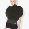 Der ärmellose Pullover mit Schlingenmuster Der ärmellose Pullover mit Schlingenmuster