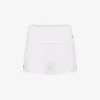 Die weißen Mini-Shorts mit Strumpfhaltern Die weißen Mini-Shorts mit Strumpfhaltern